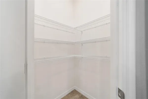 a view of small space with racks on the wall