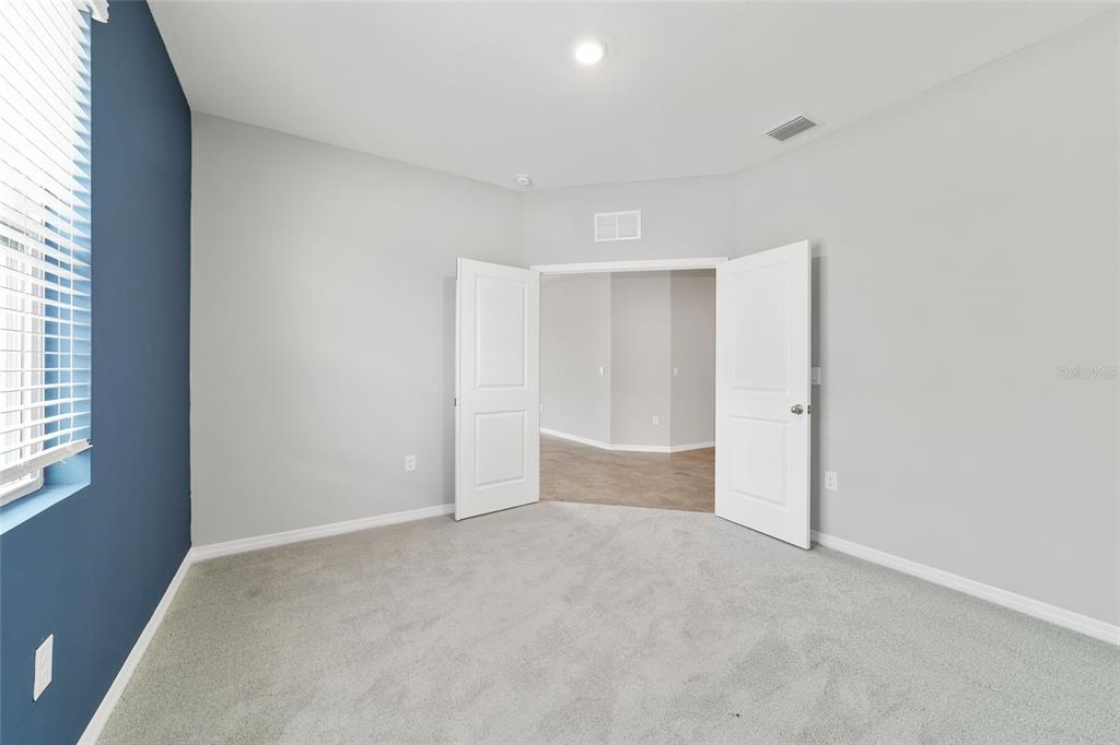 5339 Northwest 46th Ln Road Ocala, FL 34482 - Photo 38 of 79 an empty room with windows