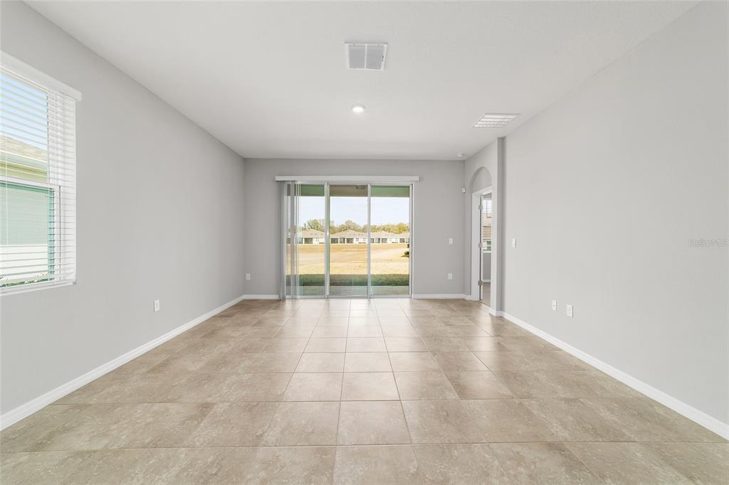 5339 Northwest 46th Ln Road Ocala, FL 34482 - Photo 7 of 79 a view of an empty room and window