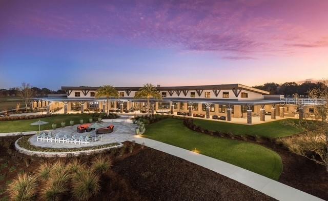 5339 Northwest 46th Ln Road Ocala, FL 34482 - Photo 75 of 79 a view of swimming pool with a garden and seating area