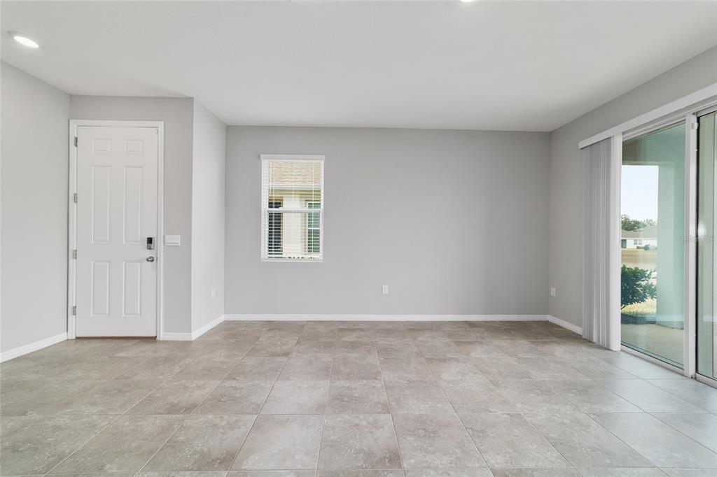 5339 Northwest 46th Ln Road Ocala, FL 34482 - Photo 9 of 79 a view of an empty room with window