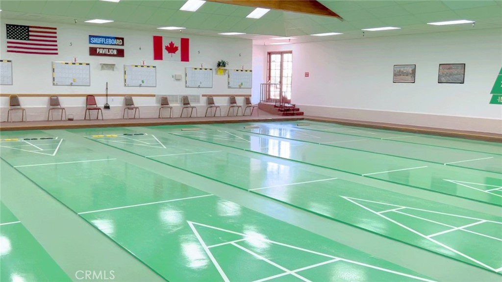 69801 Ramon Road Cathedral City, CA 92234 - Photo 16 of 41 a room with pool table and windows