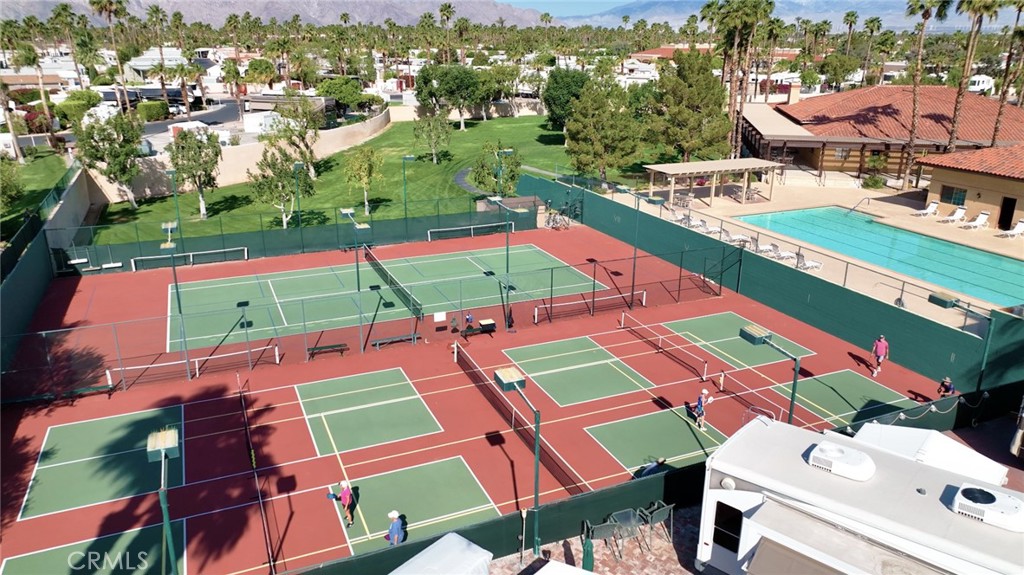 69801 Ramon Road Cathedral City, CA 92234 - Photo 26 of 41 an aerial view of a houses with a swimming pool