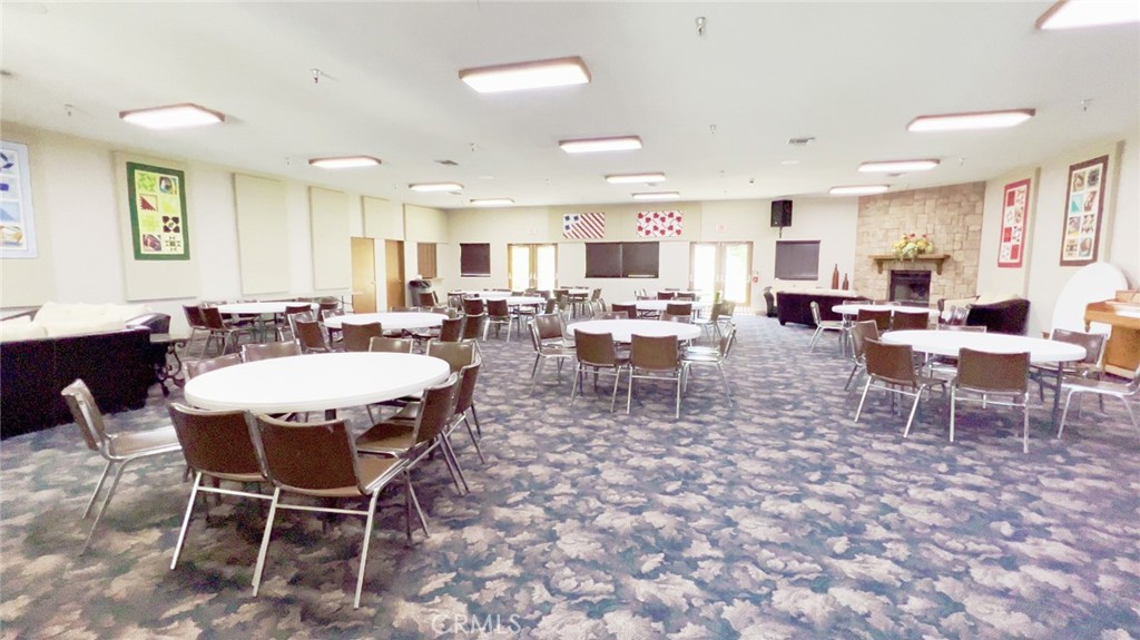 69801 Ramon Road Cathedral City, CA 92234 - Photo 33 of 41 a view of a dining room with furniture
