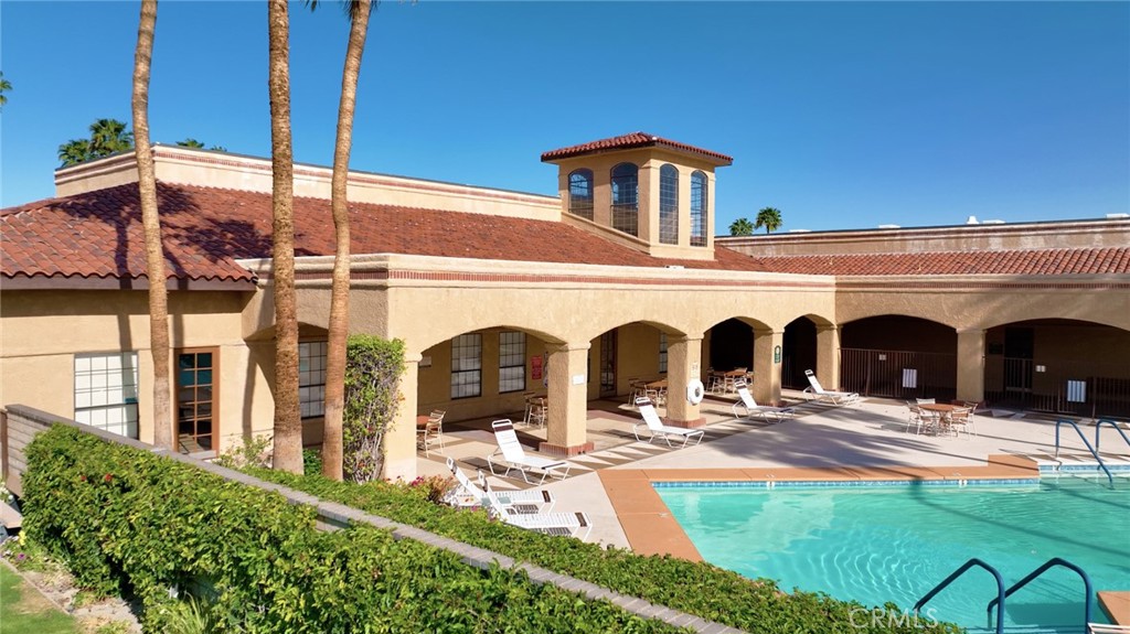 69801 Ramon Road Cathedral City, CA 92234 - Photo 9 of 41 a front view of house with yard
