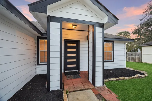 a front view of a house with a porch