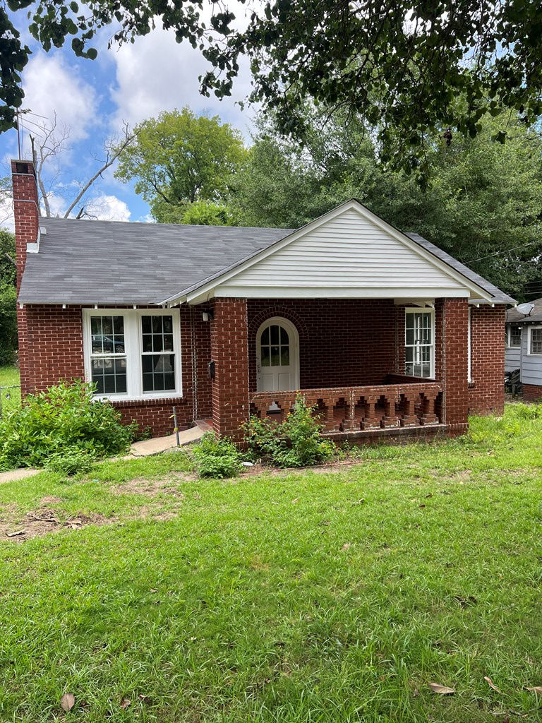 2211 8th Street Columbus, GA 31906 - Photo 2 of 16 front of cute brick home with quaint covered front