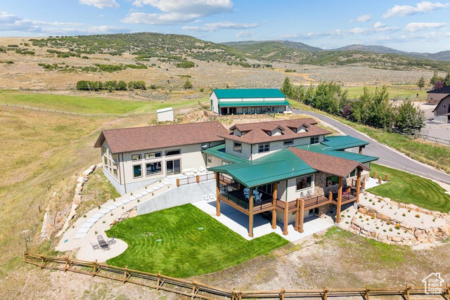 6117 North Rocky Ridge Road Peoa, UT 84061 - Photo 21 of 83 Drone / aerial view with a mountain view