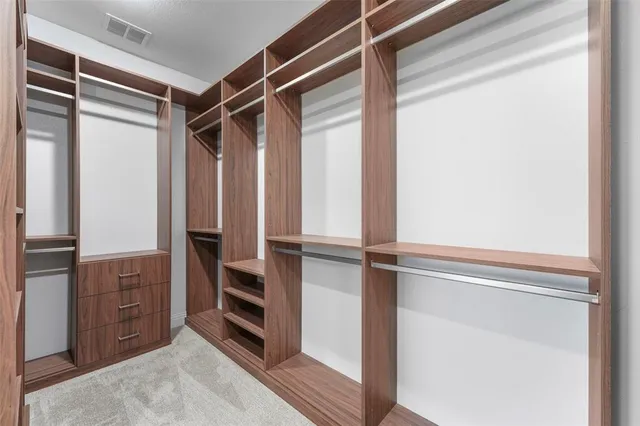 a white bath tub sitting next to a bathroom