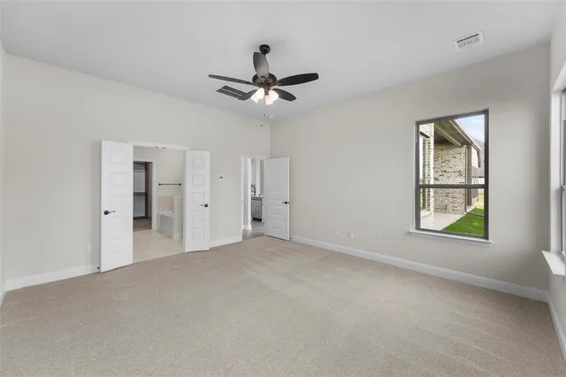 a bathroom with a double vanity sink mirror and shower