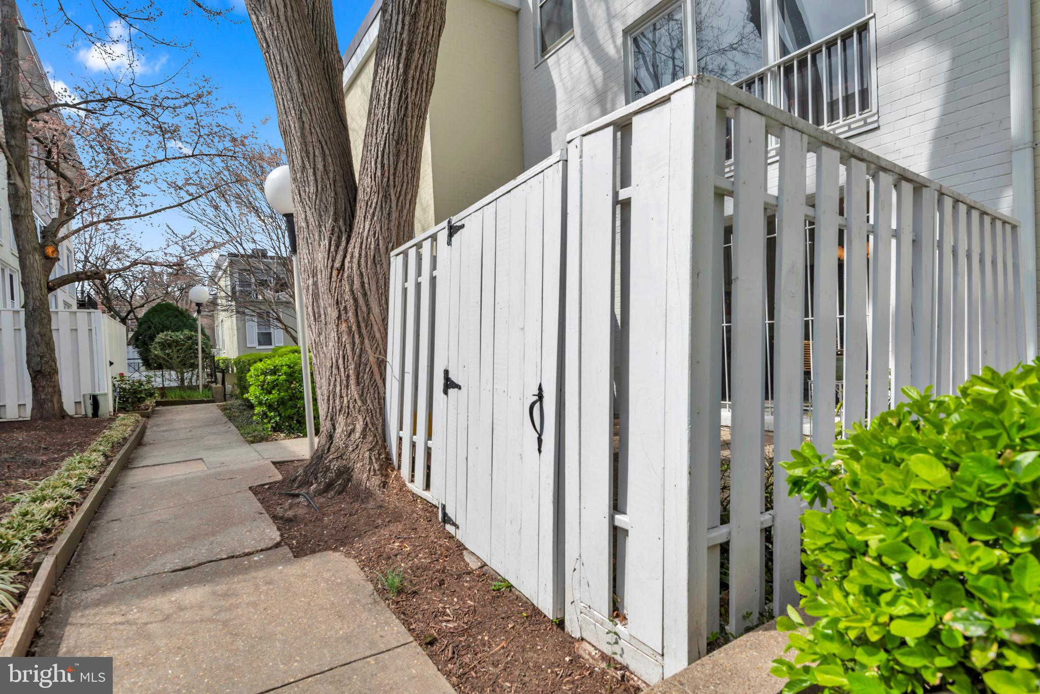 164 G Street Southwest, Unit 144 Washington, DC 20024 - Photo 40 of 71 Rear Patio Gate to Common Grounds