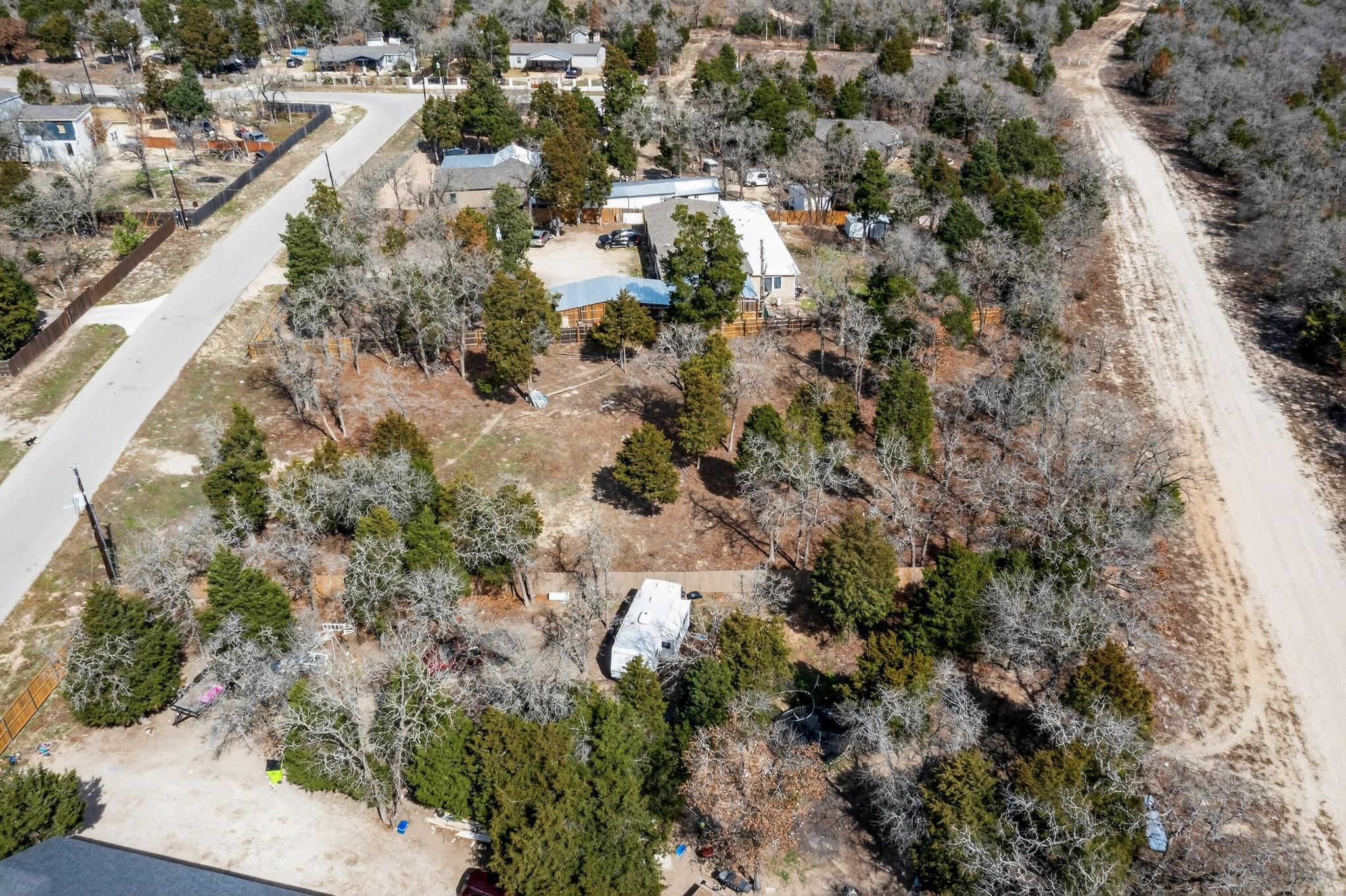 147 Jasmine Heights Elgin, TX 78621 - Photo 18 of 22 an aerial view of residential houses with outdoor space