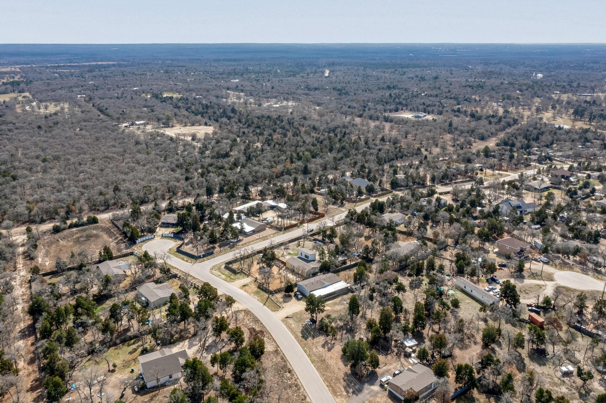 147 Jasmine Heights Elgin, TX 78621 - Photo 6 of 22 an aerial view of multiple house