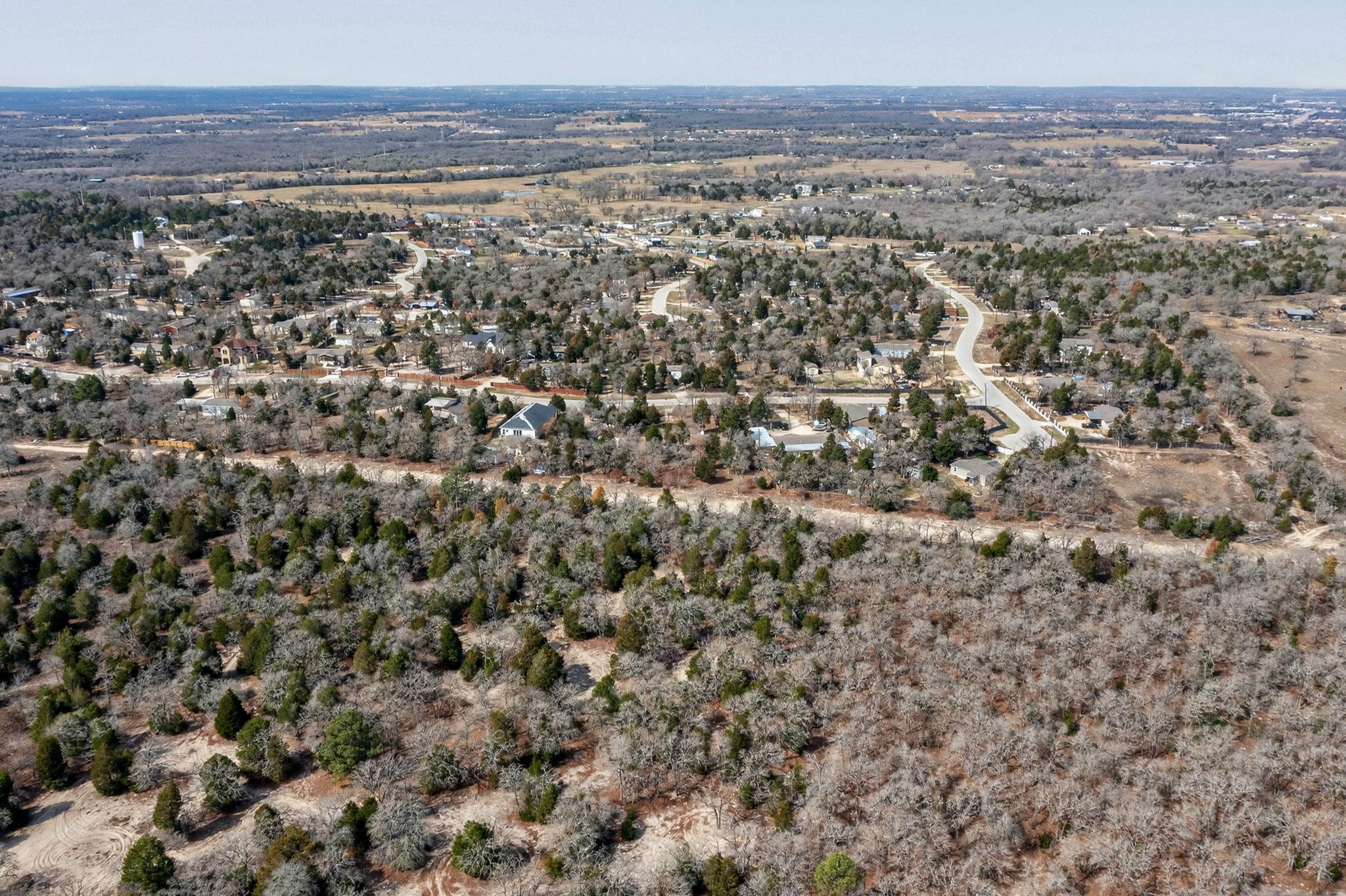 147 Jasmine Heights Elgin, TX 78621 - Photo 7 of 22 an aerial view of residential houses with outdoor space