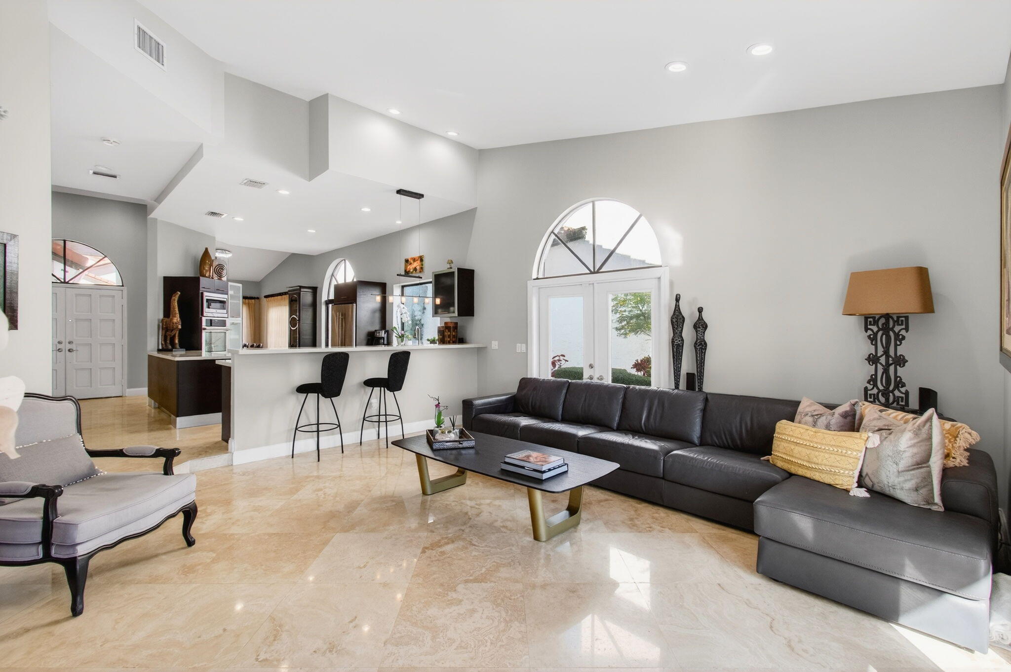 23145 Via Stel Boca Raton, FL 33433 - Photo 12 of 72 a living room with furniture and a large window