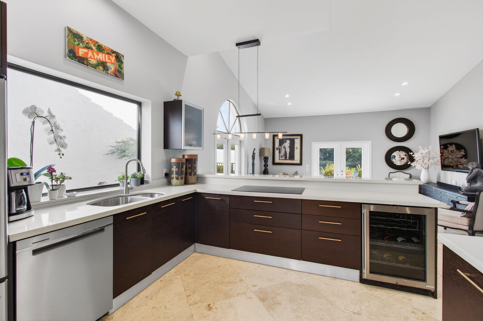 23145 Via Stel Boca Raton, FL 33433 - Photo 21 of 72 a kitchen with a sink and cabinets