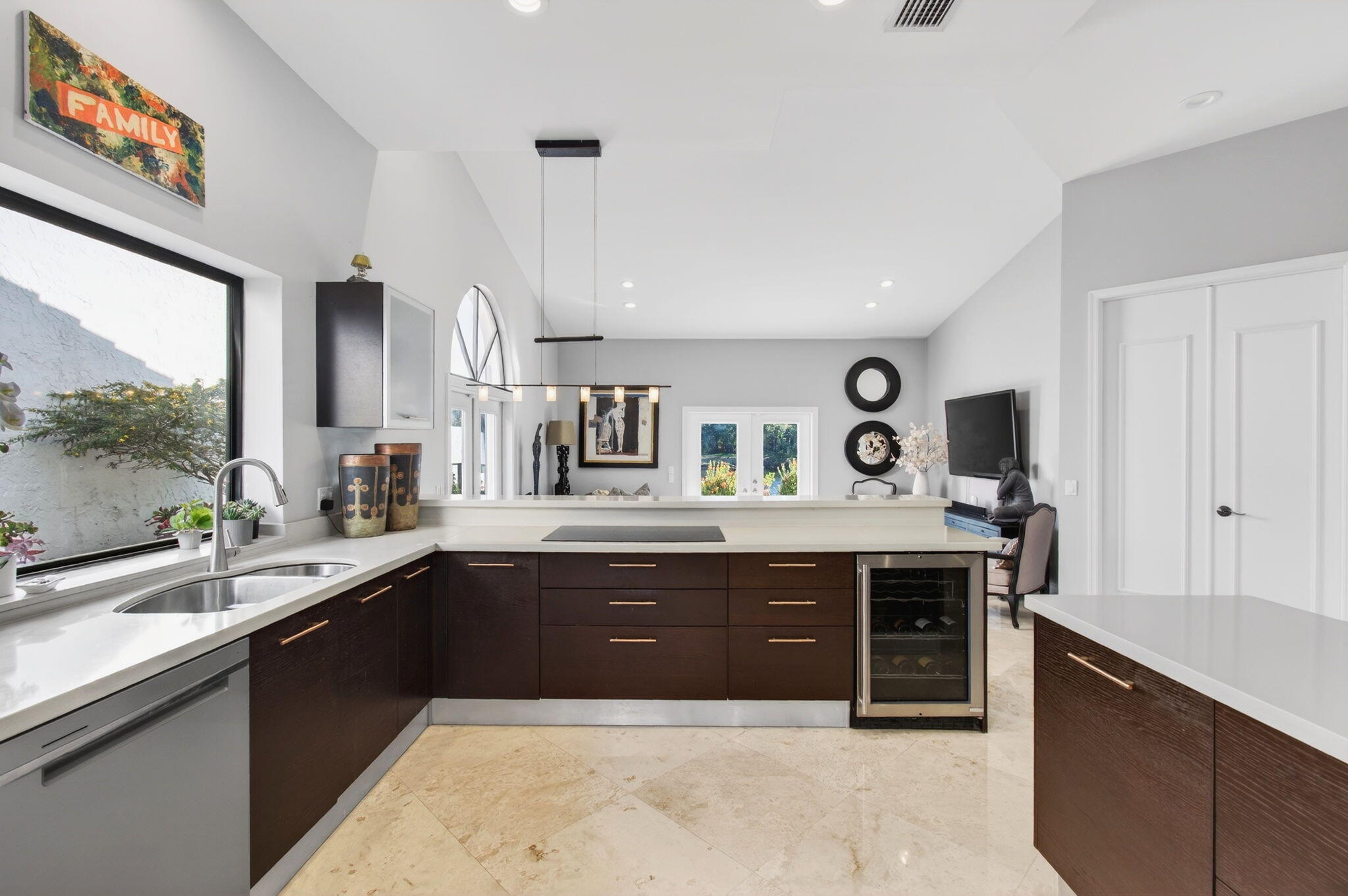 23145 Via Stel Boca Raton, FL 33433 - Photo 22 of 72 a large kitchen with a sink and cabinets