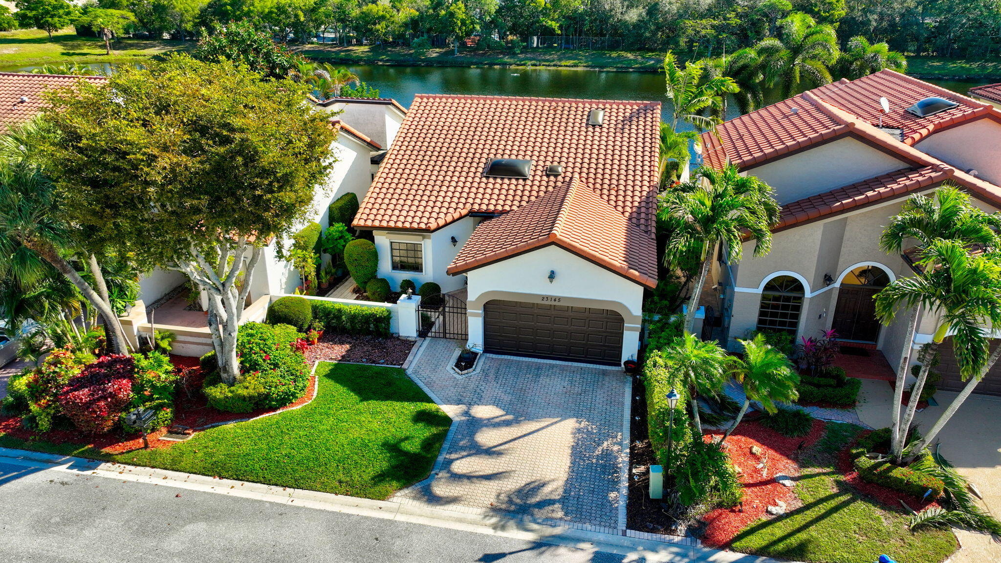 23145 Via Stel Boca Raton, FL 33433 - Photo 48 of 72 an aerial view of a house with garden space and street view