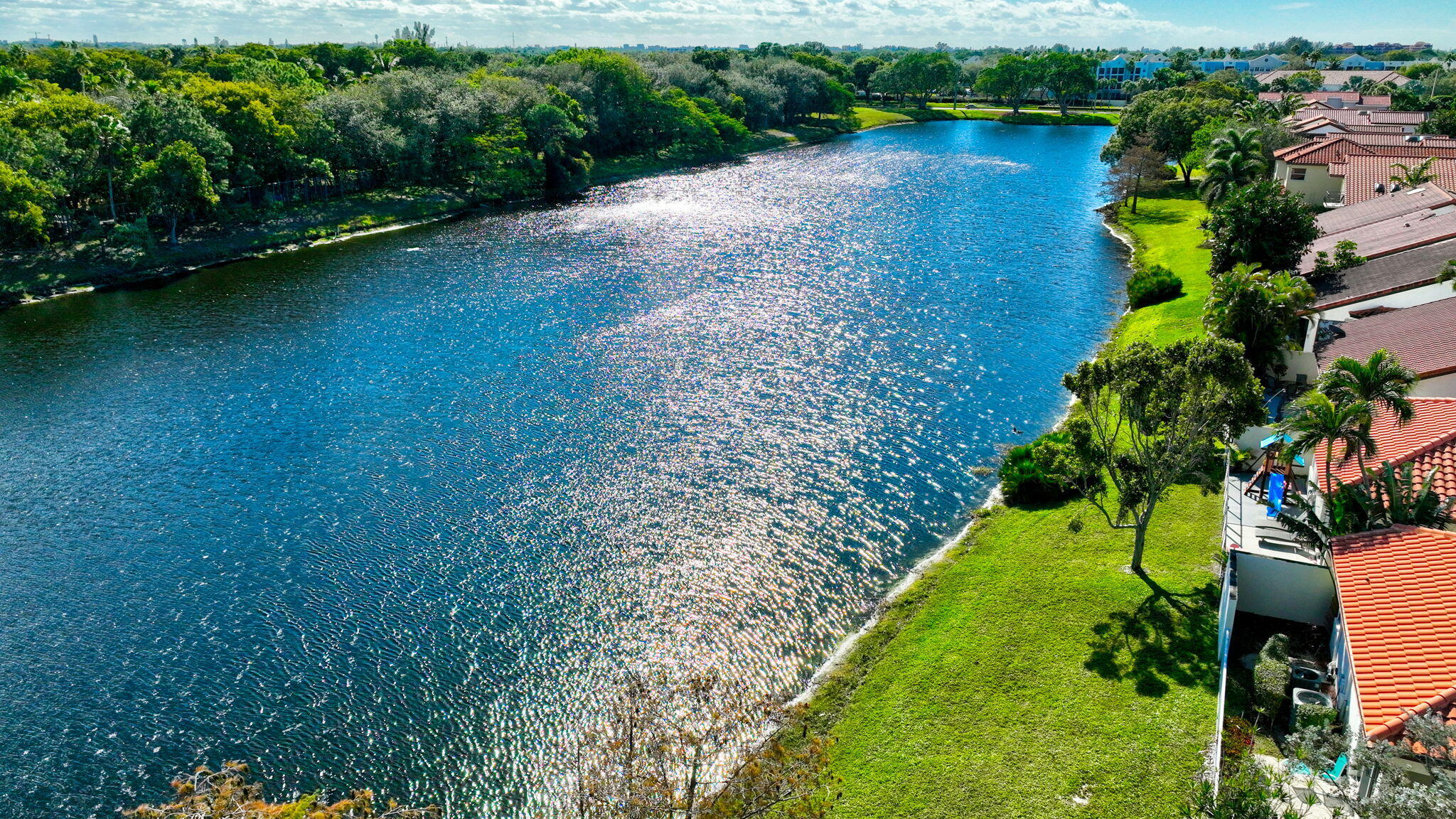 23145 Via Stel Boca Raton, FL 33433 - Photo 52 of 72 a view of a garden with a lake