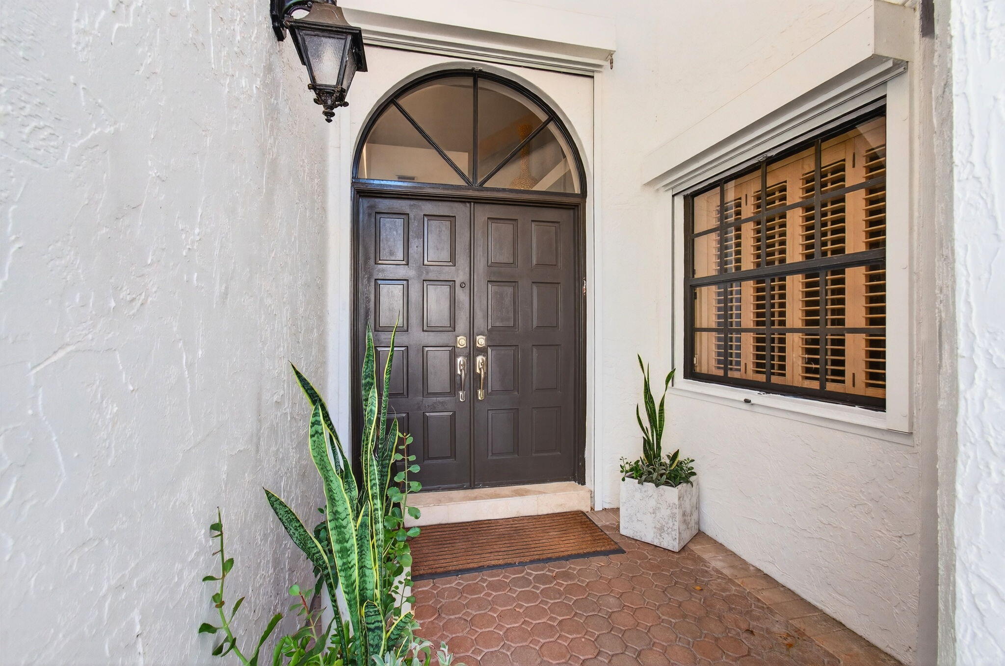 23145 Via Stel Boca Raton, FL 33433 - Photo 7 of 72 a view of entrance gate of the house