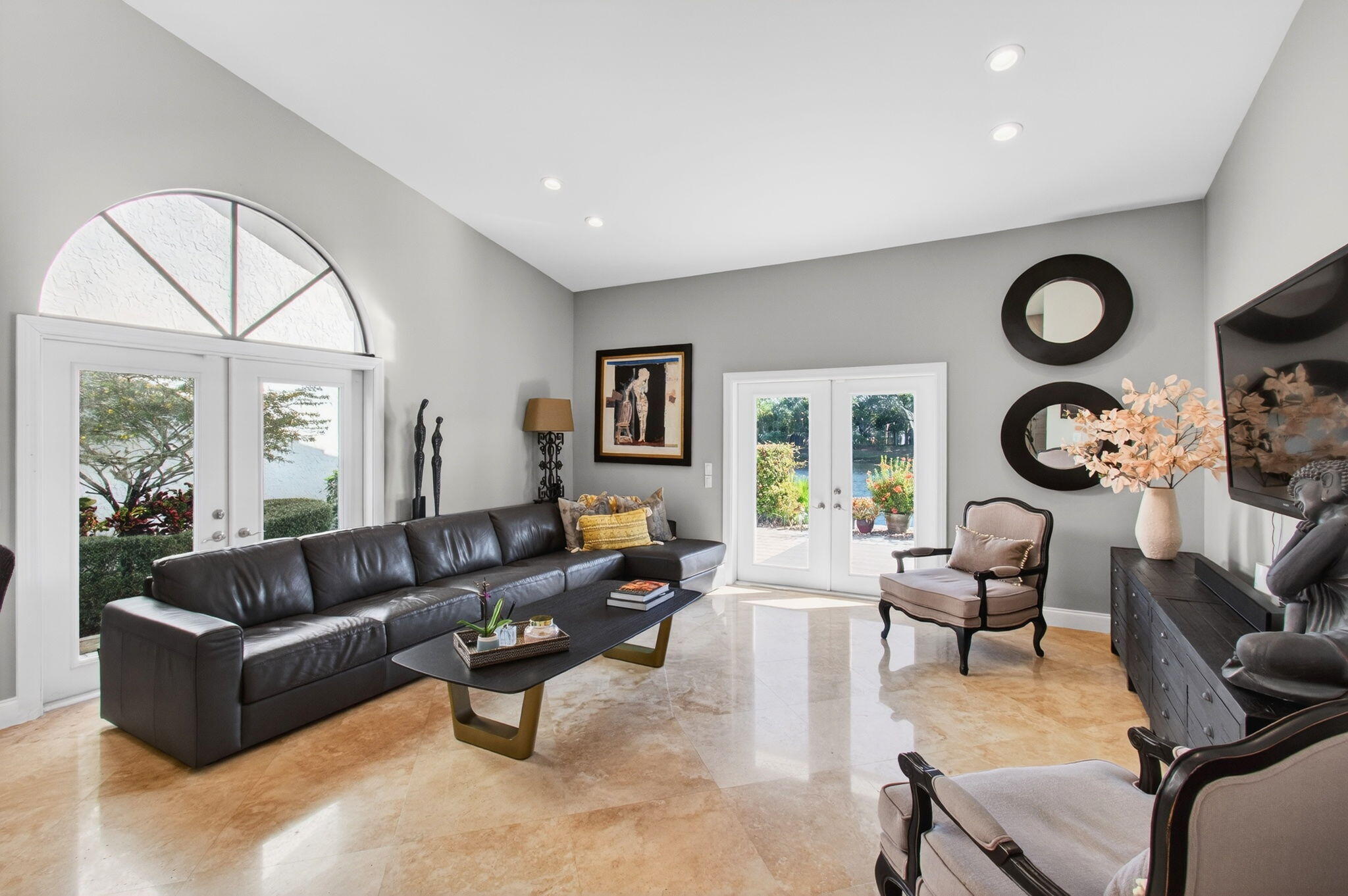 23145 Via Stel Boca Raton, FL 33433 - Photo 10 of 72 a living room with furniture and a large window