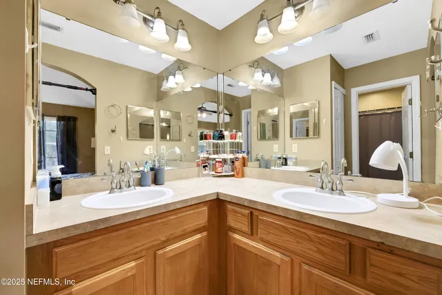 a view of a back yard from a balcony