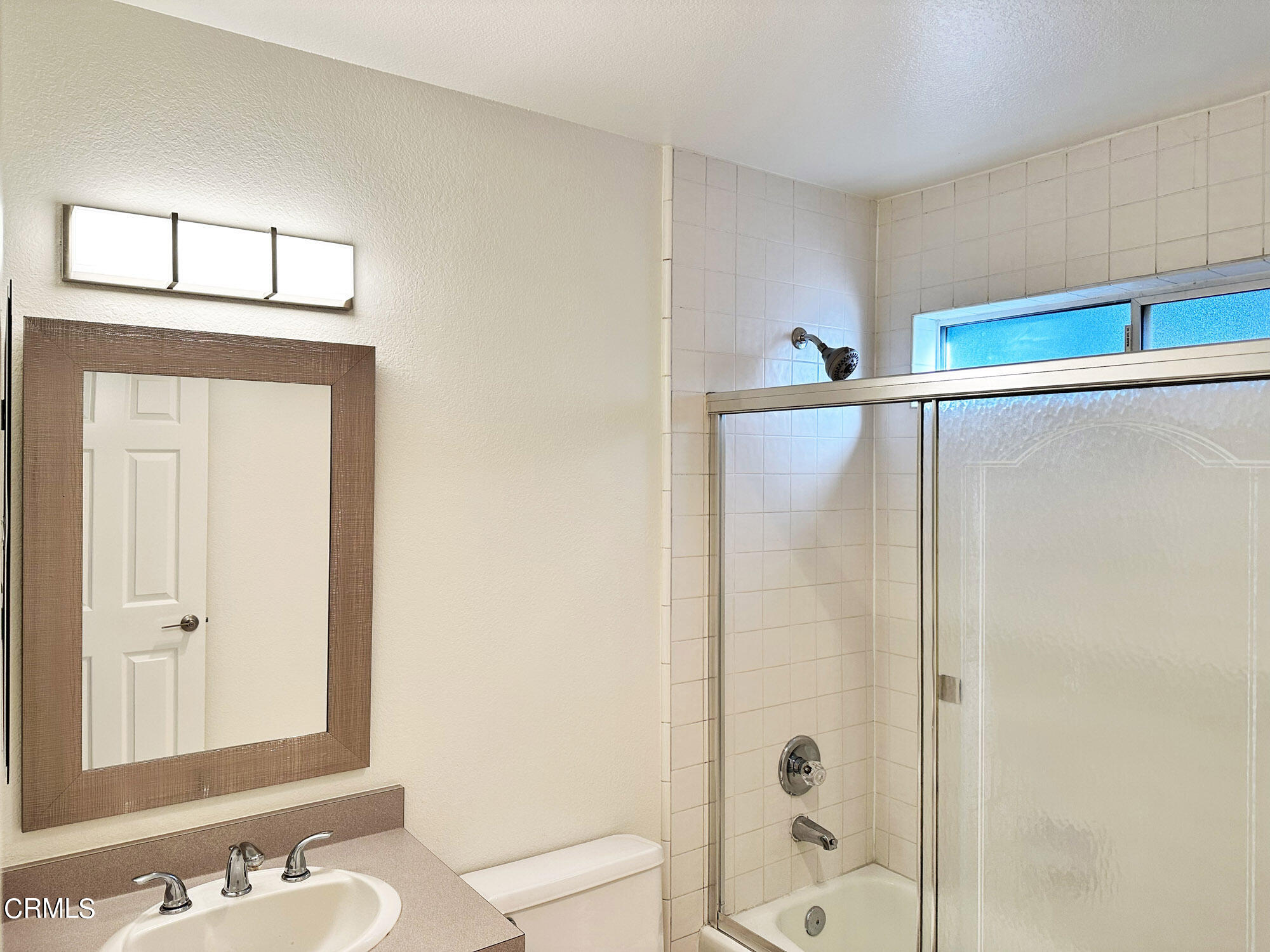 356 Highland Drive Oxnard, CA 93035 - Photo 11 of 26 a bathroom with a shower and a sink