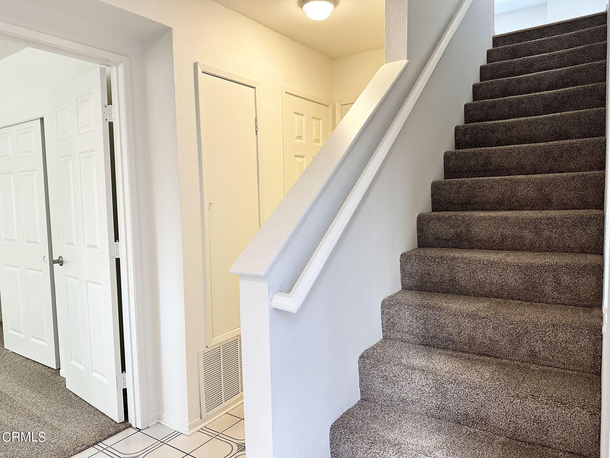 356 Highland Drive Oxnard, CA 93035 - Photo 12 of 26 a view of staircase with white walls
