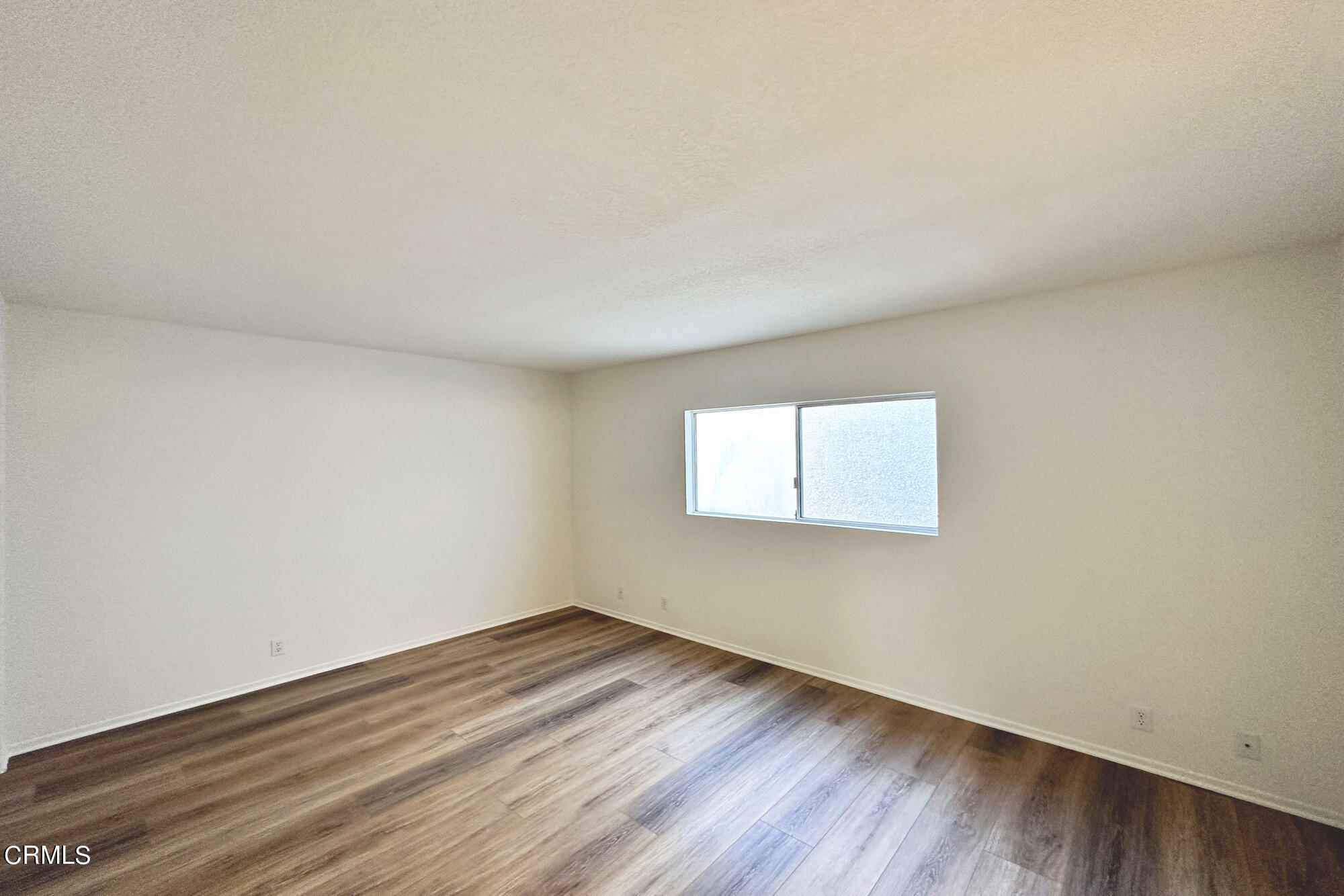 356 Highland Drive Oxnard, CA 93035 - Photo 14 of 26 a view of empty room with wooden floor