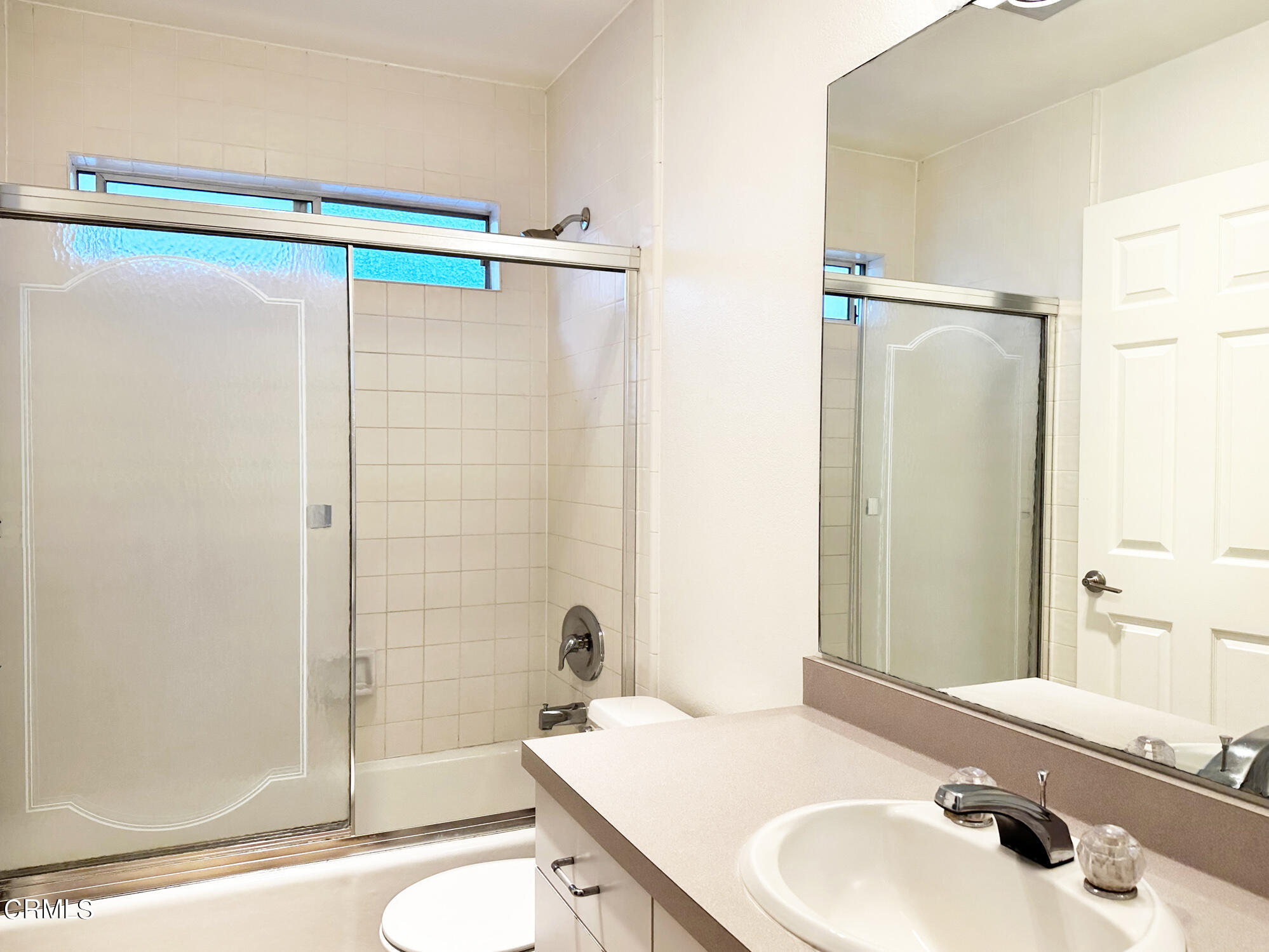 356 Highland Drive Oxnard, CA 93035 - Photo 16 of 26 a bathroom with a sink and a mirror