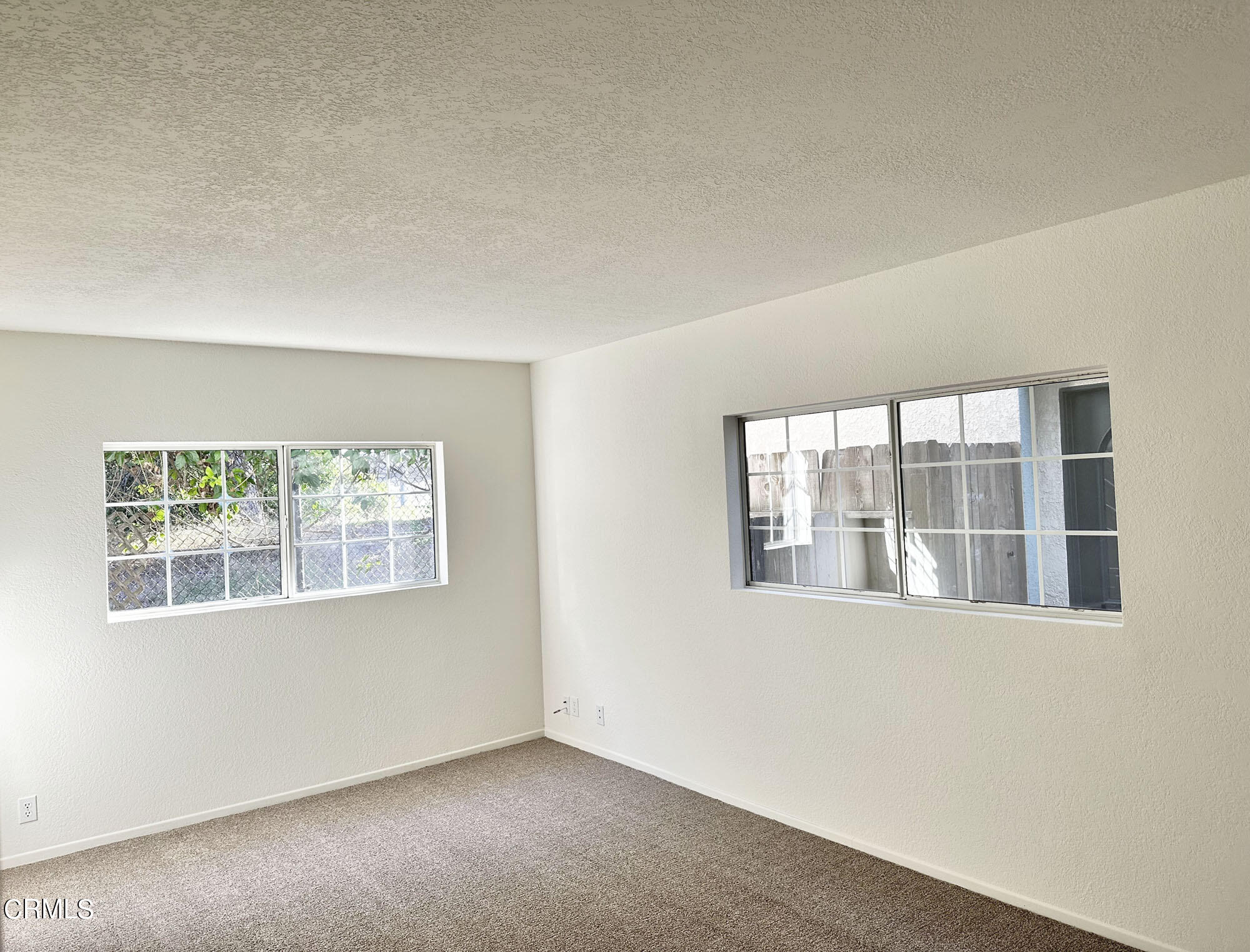 356 Highland Drive Oxnard, CA 93035 - Photo 9 of 26 a view of an empty room with a window