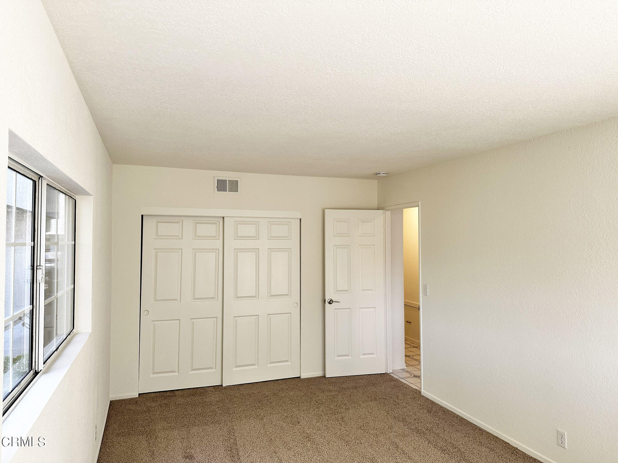 356 Highland Drive Oxnard, CA 93035 - Photo 10 of 26 an empty room with windows