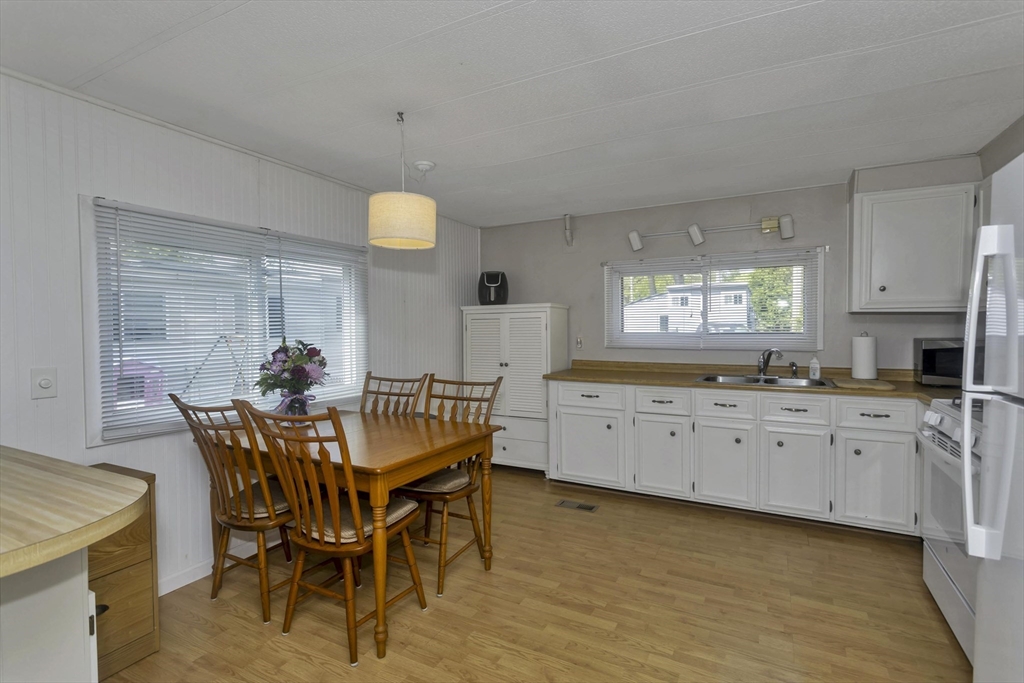 32 Puffin Drive Chicopee, MA 01020 - Photo 4 of 25 a dining room with furniture and window
