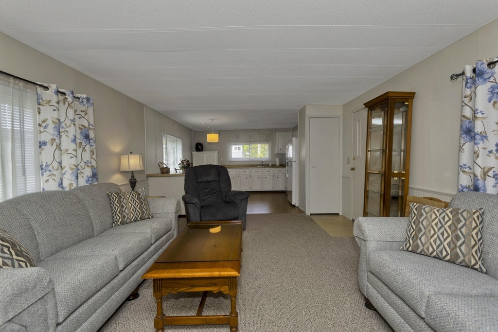 32 Puffin Drive Chicopee, MA 01020 - Photo 9 of 25 a living room with furniture and a couch