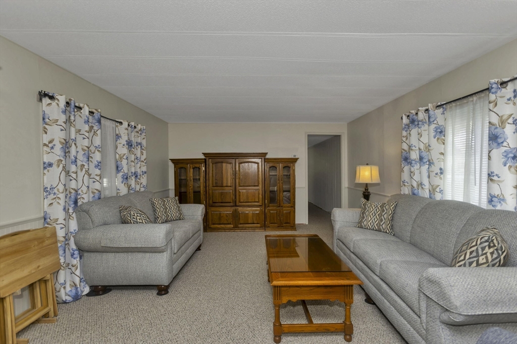 32 Puffin Drive Chicopee, MA 01020 - Photo 10 of 25 a living room with furniture and a couch