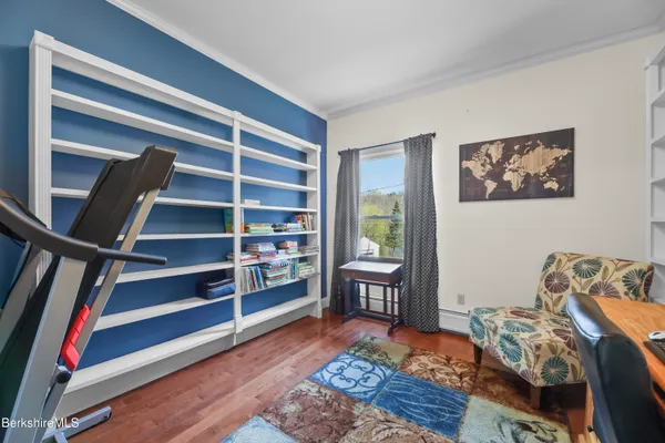 a bedroom with a bed and closet