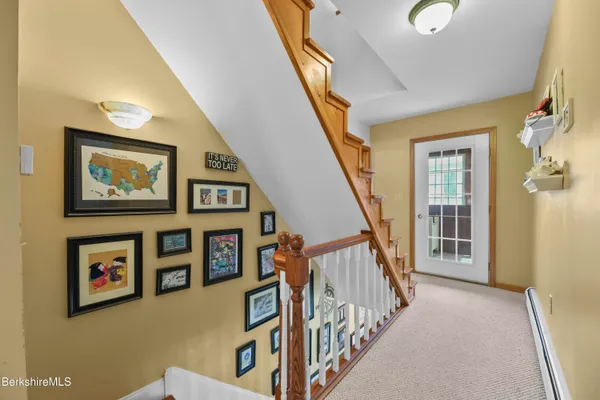 a view of a hallway with windows