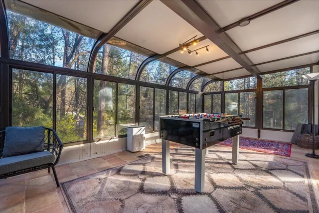 a living room with couch and a table