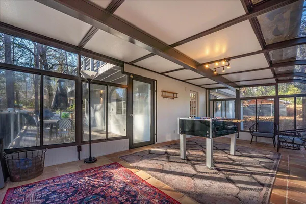 a living room with a rug