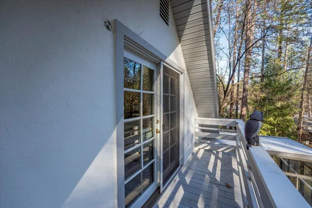 a view of balcony and wooden floor