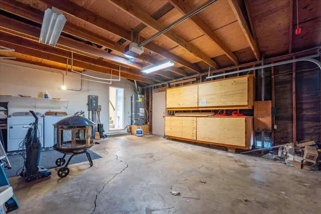 a view of a town with mountains in the background