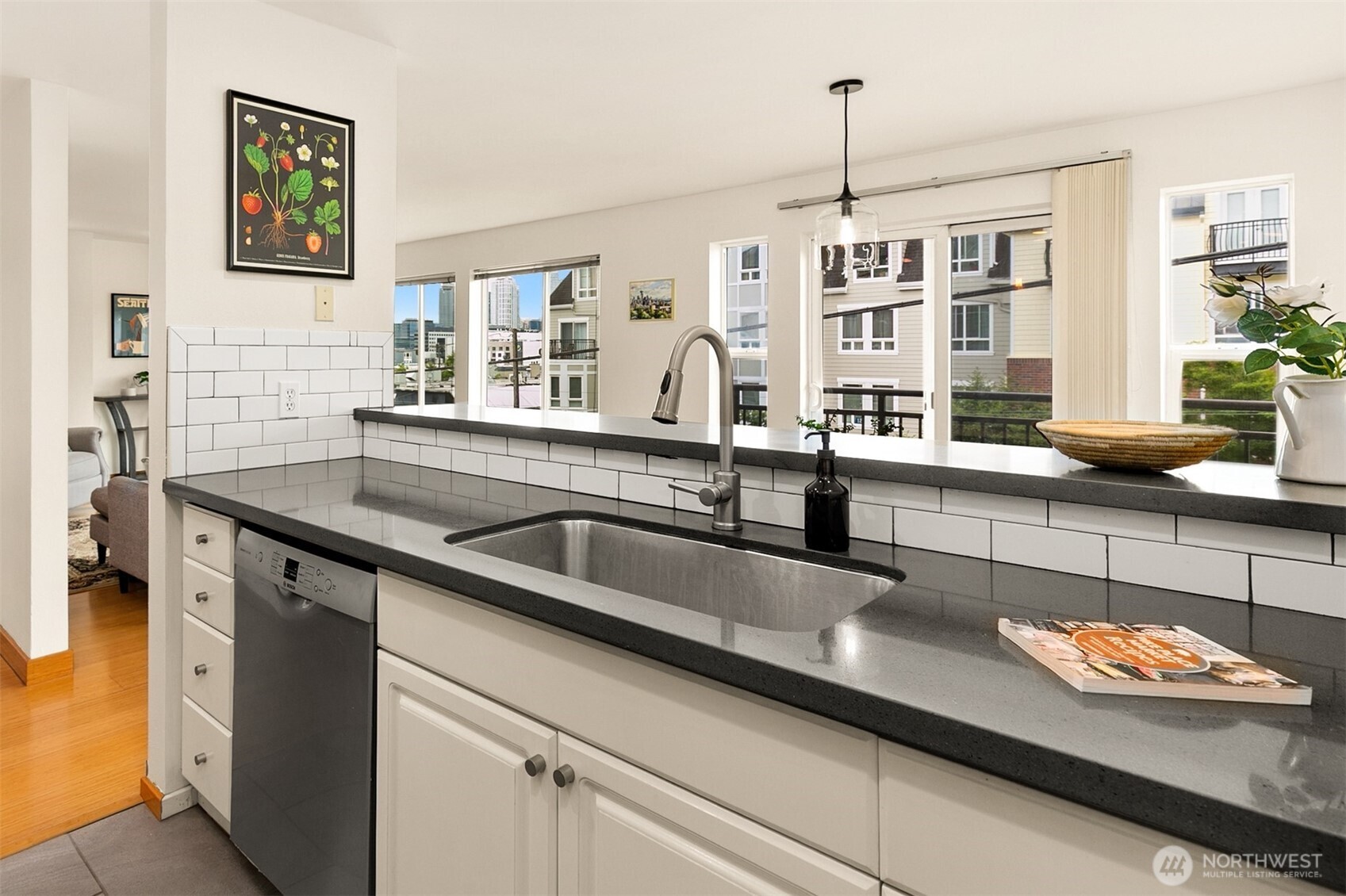 500 Aloha Street, Unit 202 Seattle, WA 98109 - Photo 6 of 15 a kitchen with a sink and a counter top space