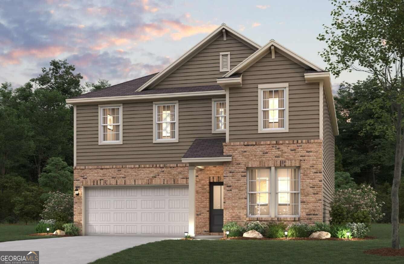 1023 Kingsley Way Lithonia, GA 30058 - Photo 1 of 1 a front view of a house with a yard