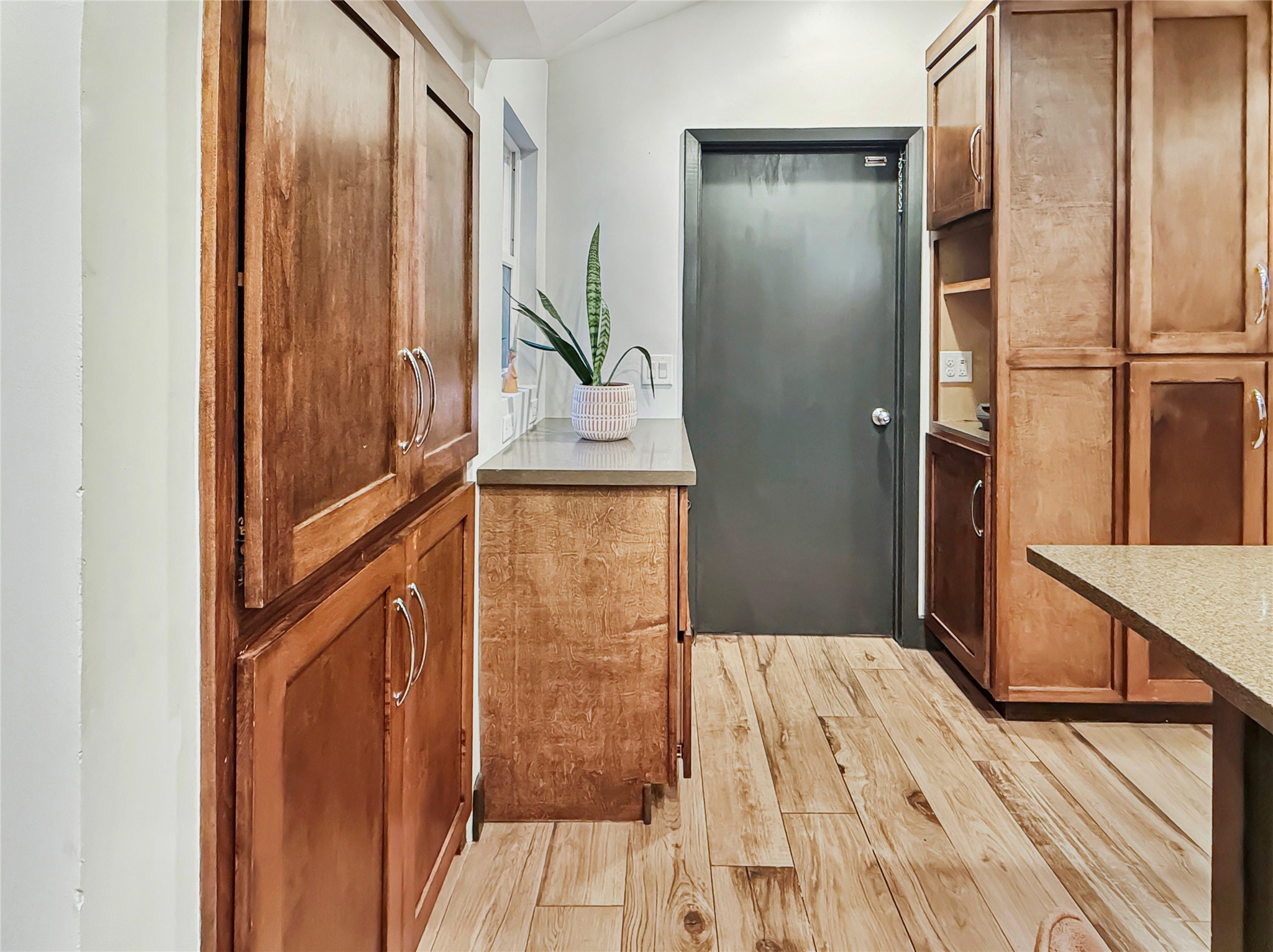 4521 Maple Street Bellaire, TX 77401 - Photo 11 of 36 Freestanding custom cabinetry ideal for a coffee station, prep area, or additional serving space. Also, additional storage to the right.