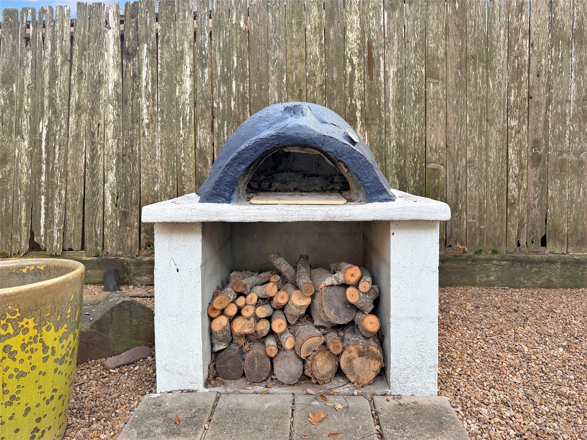 4521 Maple Street Bellaire, TX 77401 - Photo 27 of 36 ustom outdoor pizza oven perfect for entertaining and weekend gatherings.