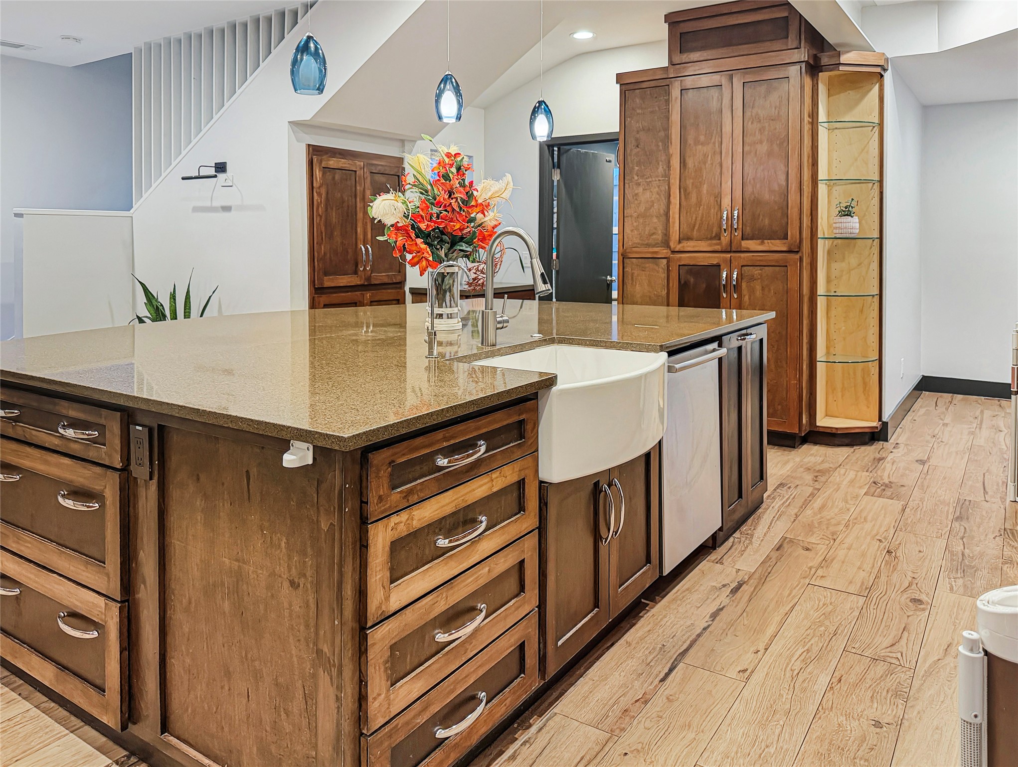 4521 Maple Street Bellaire, TX 77401 - Photo 10 of 36 Custom cabinetry and built-in storage create a functional transition space with generous prep and organization options.