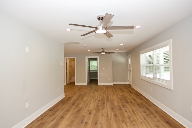 317 Pendleton Road Clemson, SC 29631 - Photo 21 of 36 Naturally illuminated, this room features warm wood flooring and recessed lighting throughout, creating a welcoming atmosphere.