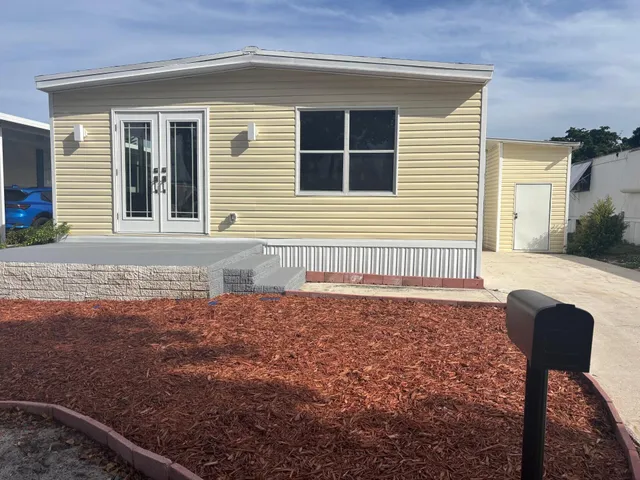 a view of backyard of house