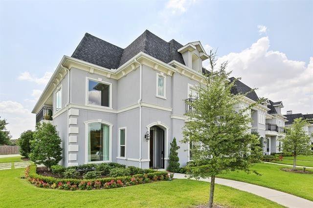 7633 Renaissance Boulevard McKinney, TX 75070 - Photo 1 of 1 a front view of a house with garden
