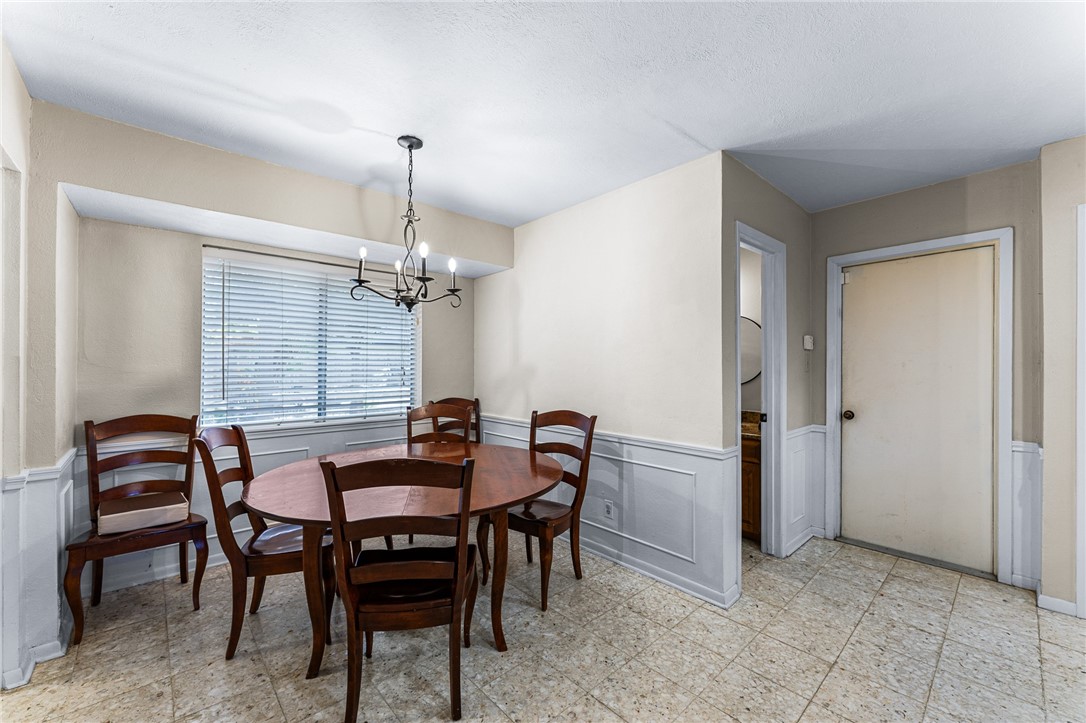4325 St George Drive Corpus Christi, TX 78413 - Photo 16 of 22 a dining room with furniture and window